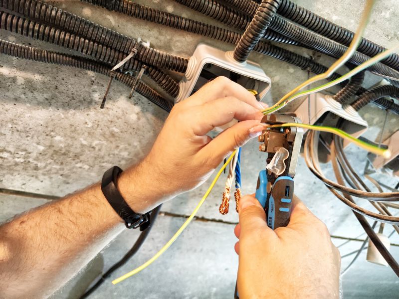 Electrician Rewiring a Commercial Space